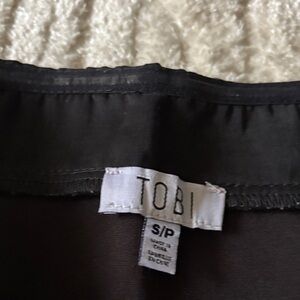 Tobi Black Slip on jump suit with Subtle Sheen